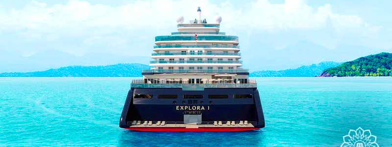 Explora Journeys Kreuzfahrtschiff in der Karibik bei Sonnenuntergang